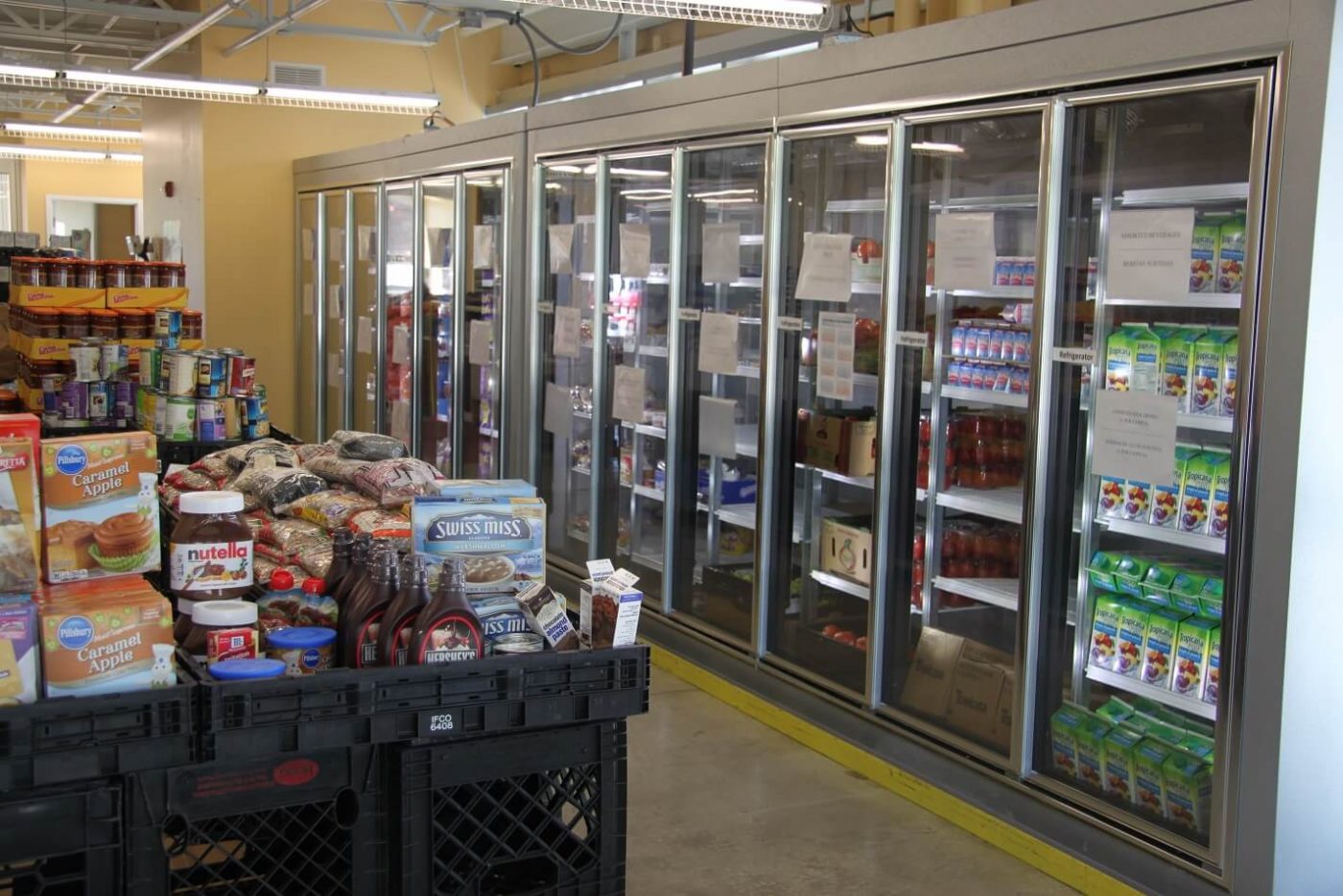 Energetic Volunteer Lights Up Gleaners Mercado Food Pantry In